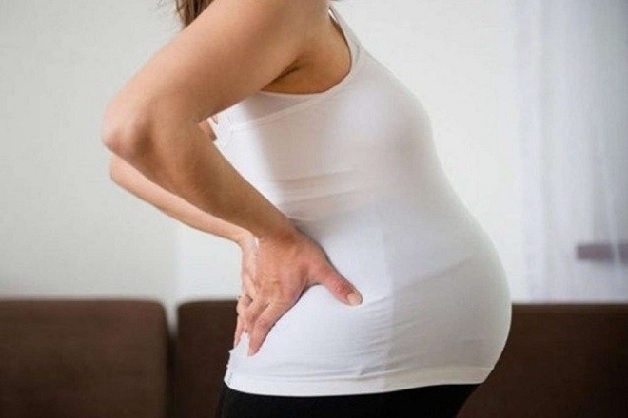 Đau lưng là dấu hiệu sắp sinh mẹ bầu cần ghi nhớ